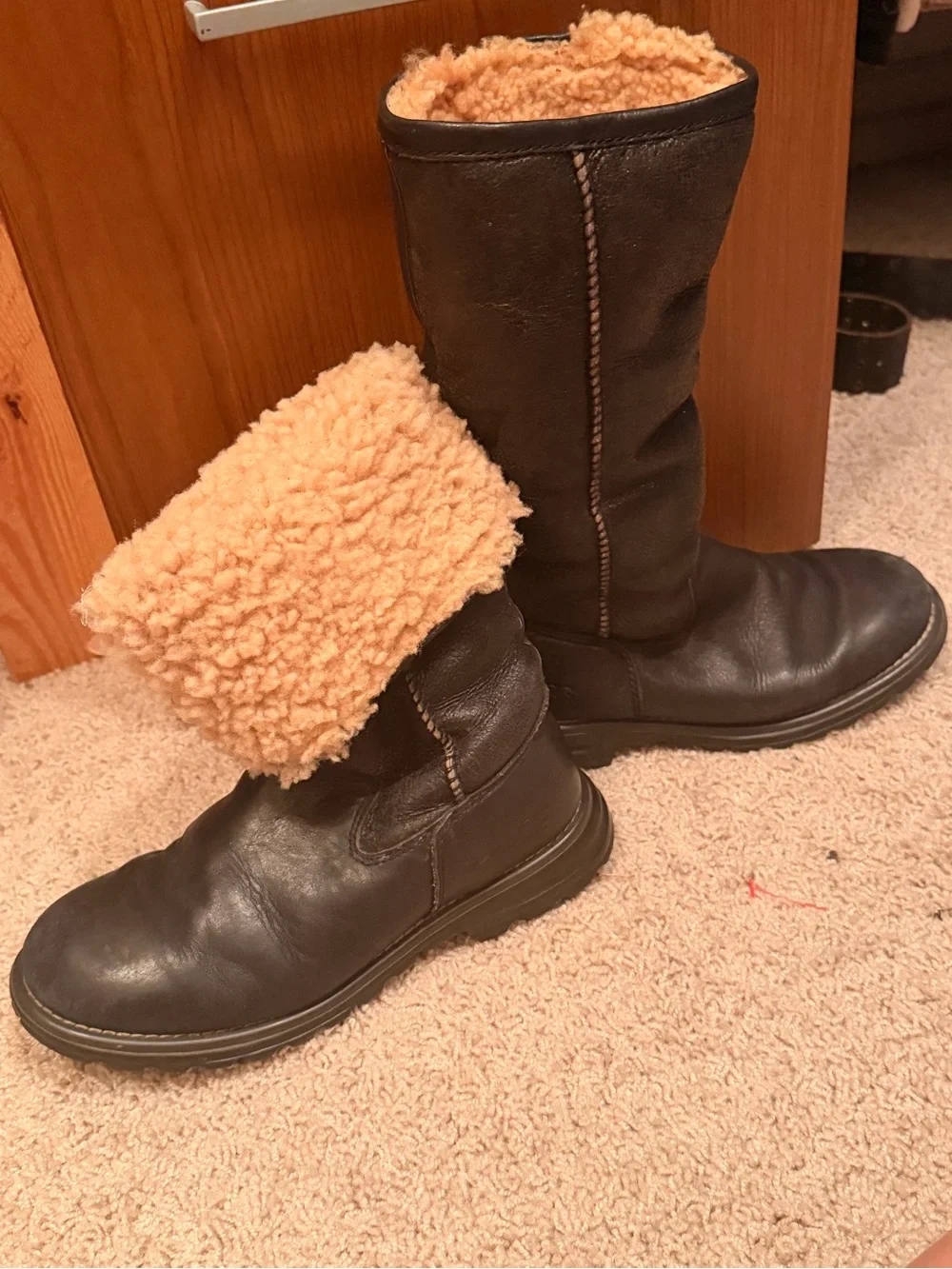 UGG Black Leather Mid-Calf Boots with Tan Shearling Lining